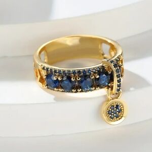 Gold and Sapphire Hanging Disc Pendant Ring